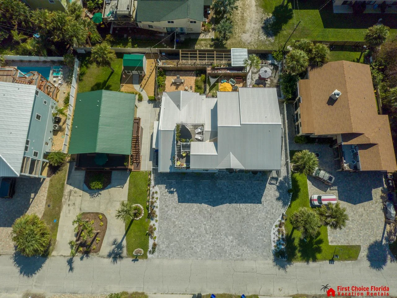 Spacious driveway and charming front yard for easy arrivals