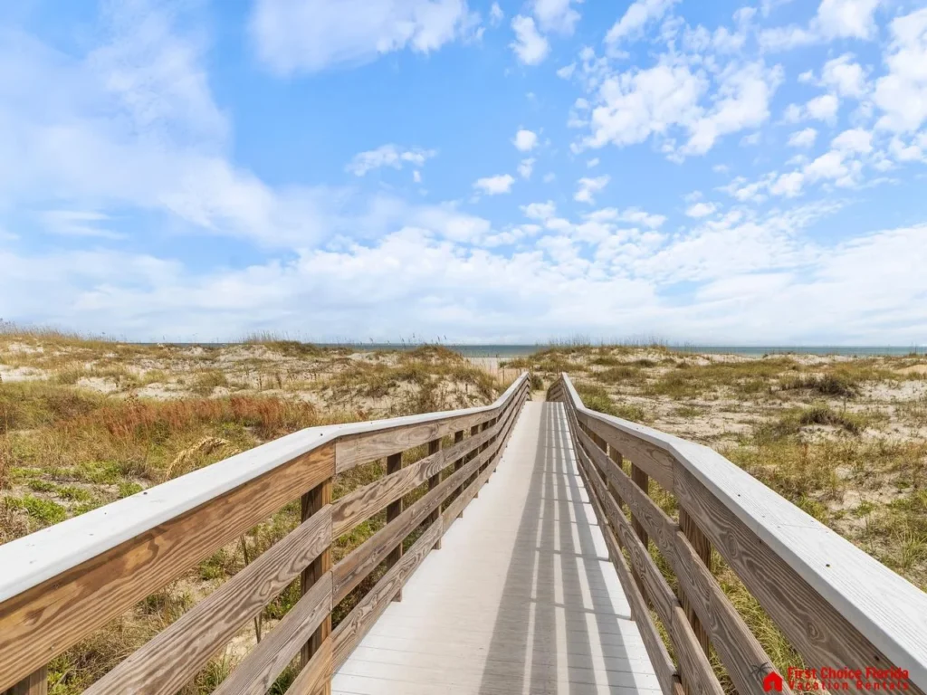 Scenic boardwalk leading to serene beach views
