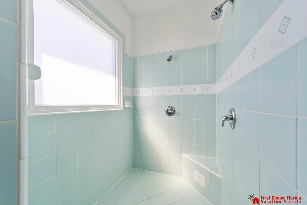 Bright, airy bathroom walk-in shower with refreshing natural light!