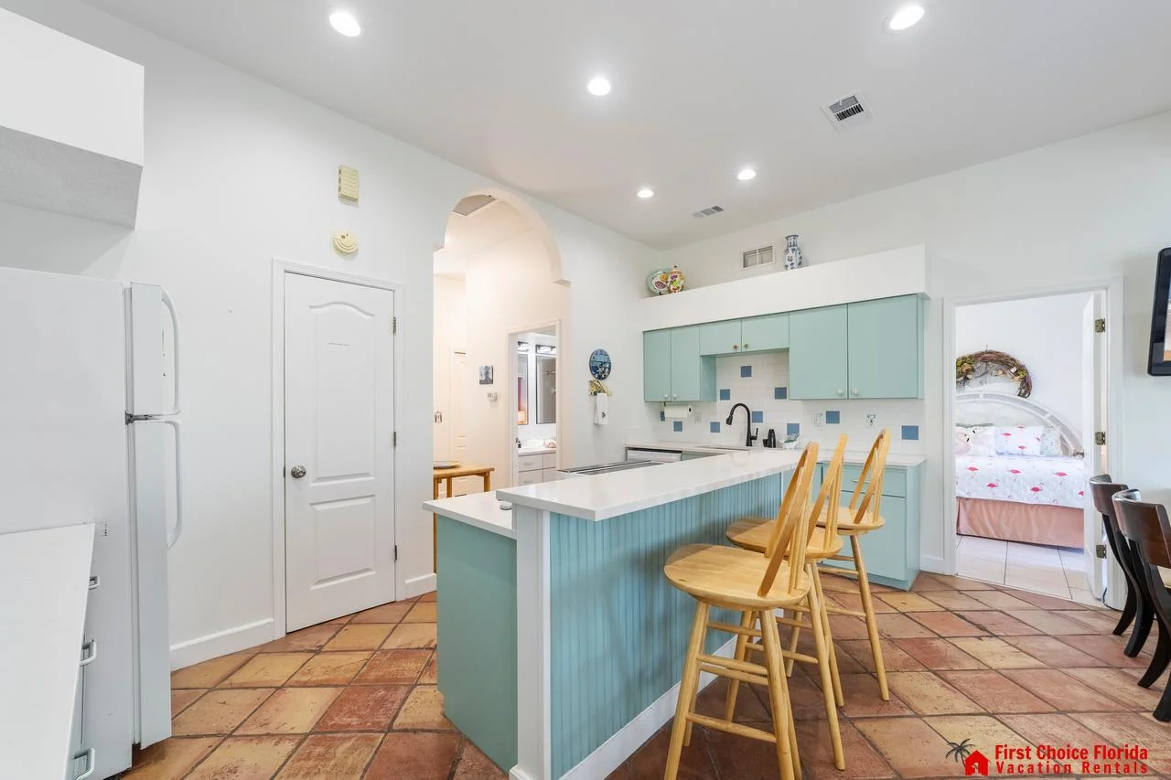Bright, airy kitchen with cozy breakfast bar seating!