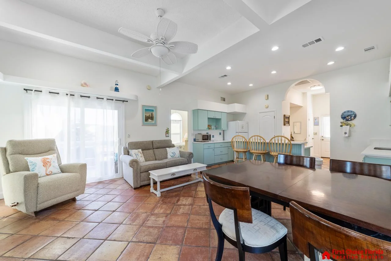 Bright open living and dining area with coastal charm!