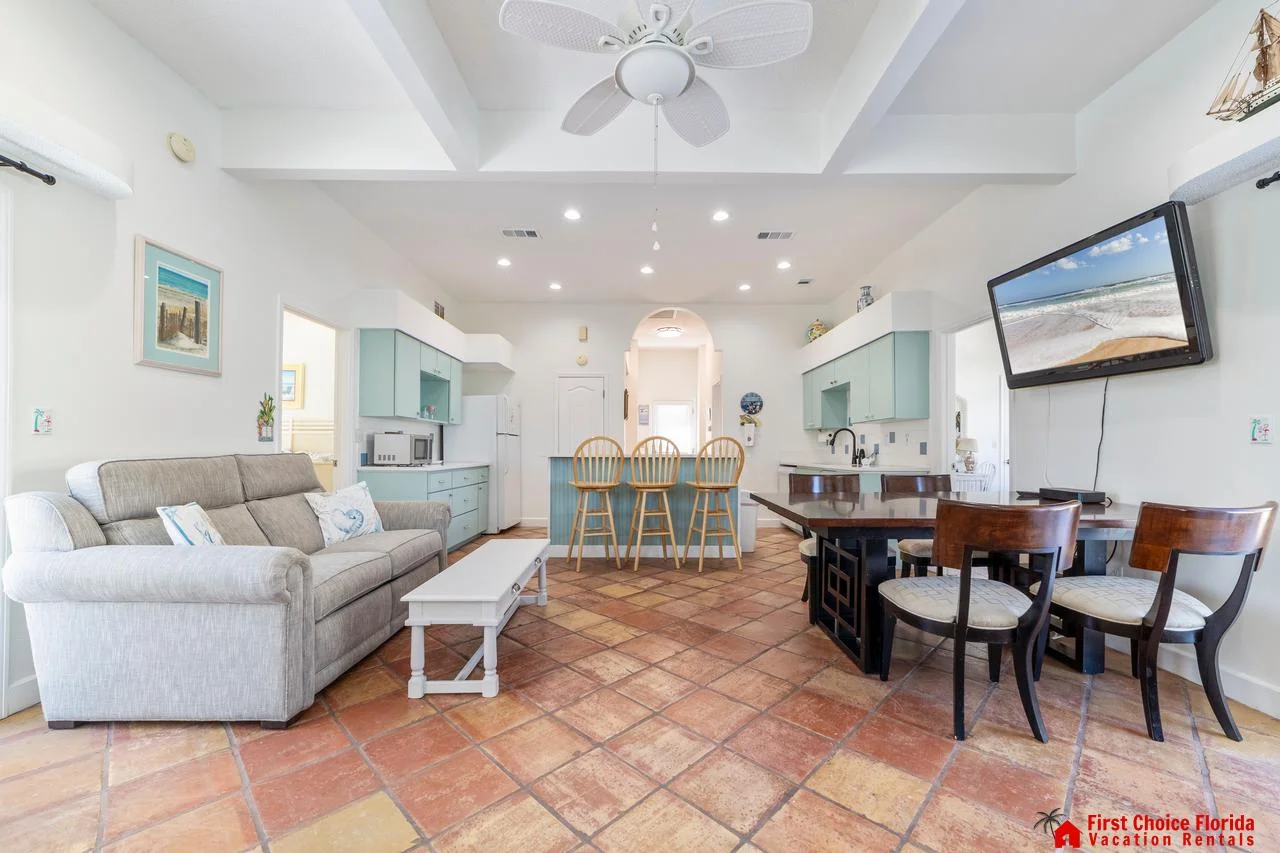 Spacious open-concept living and dining area with coastal charm!