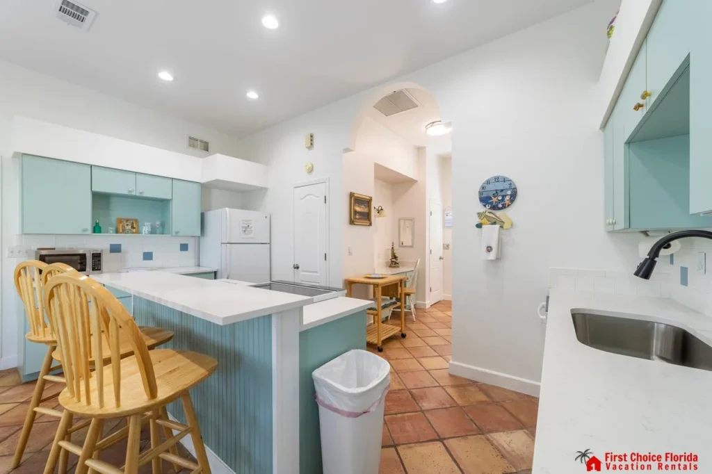 Bright, airy kitchen with cozy breakfast bar seating!