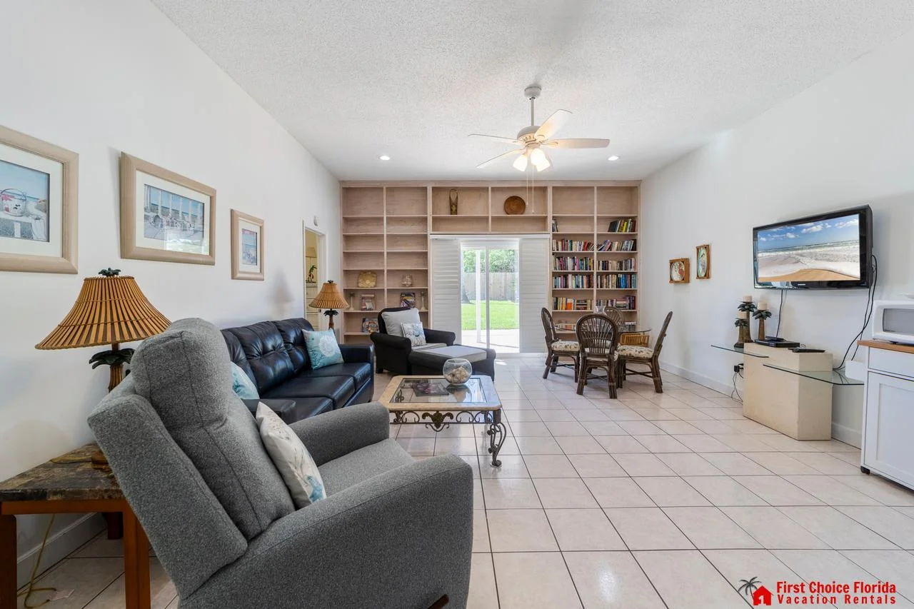 Bright and airy first floor living room with cozy seating and natural light!