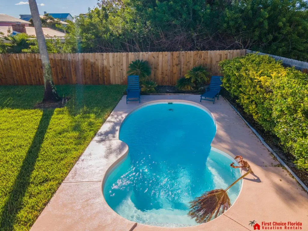 Private backyard oasis with sparkling pool and lounge chairs!