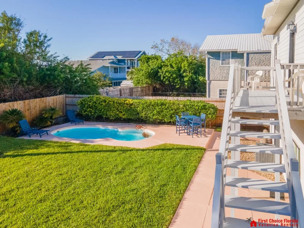 Private backyard oasis with pool and lush greenery!