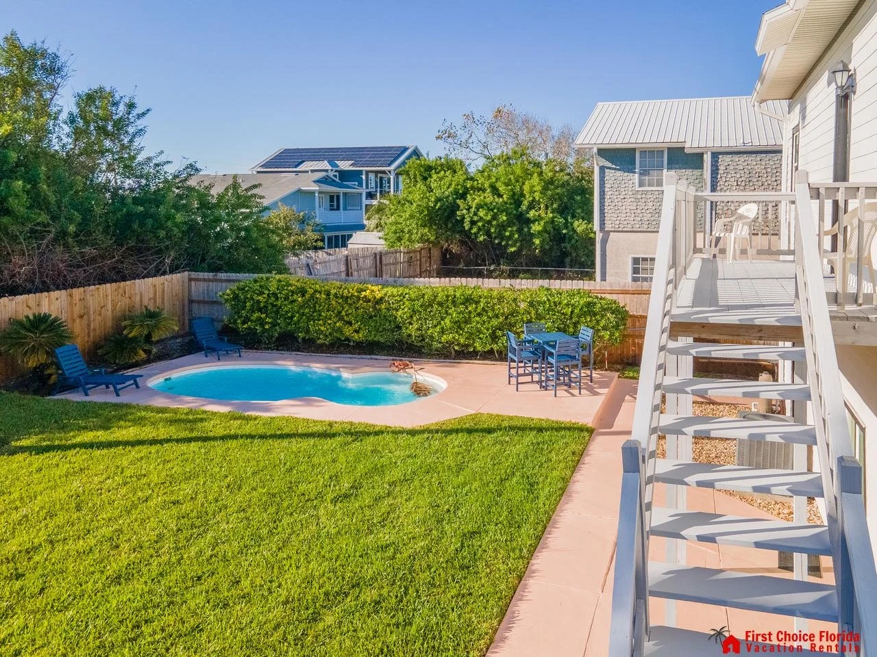 Private backyard oasis with pool and lush greenery!