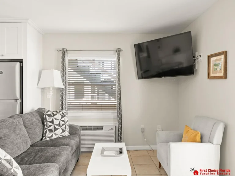 Cozy living room with plush seating and wall-mounted TV