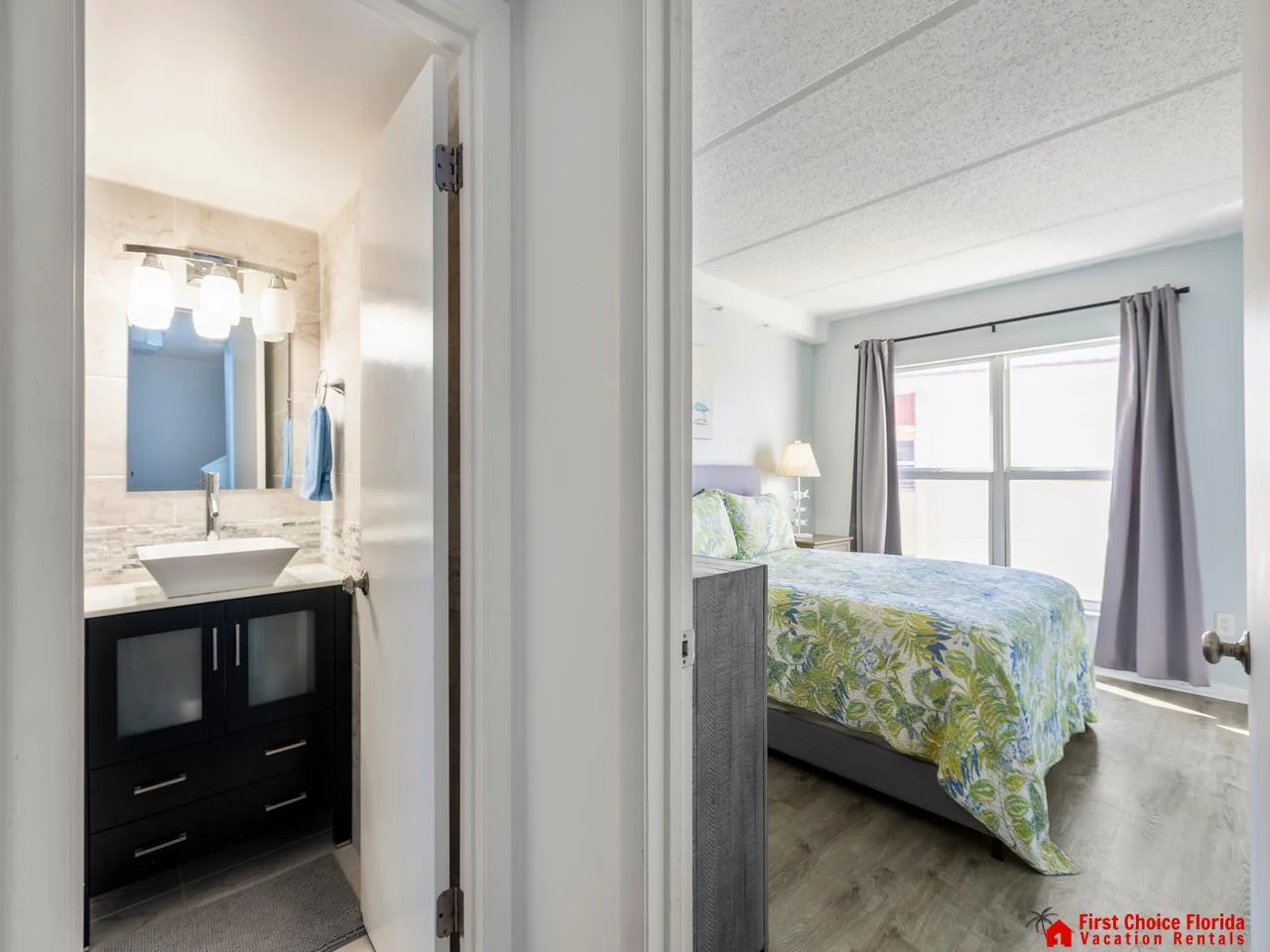 Bright guest bedroom entry with cozy bedding and natural light