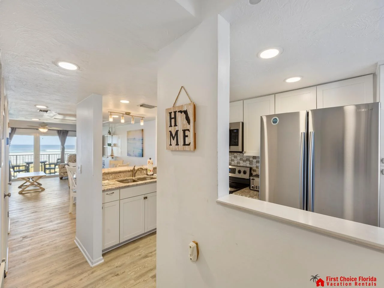 Bright, open kitchen with modern appliances and cozy dining nook