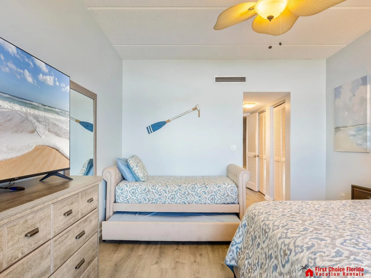 Cozy bedroom with coastal decor and calming ocean hues