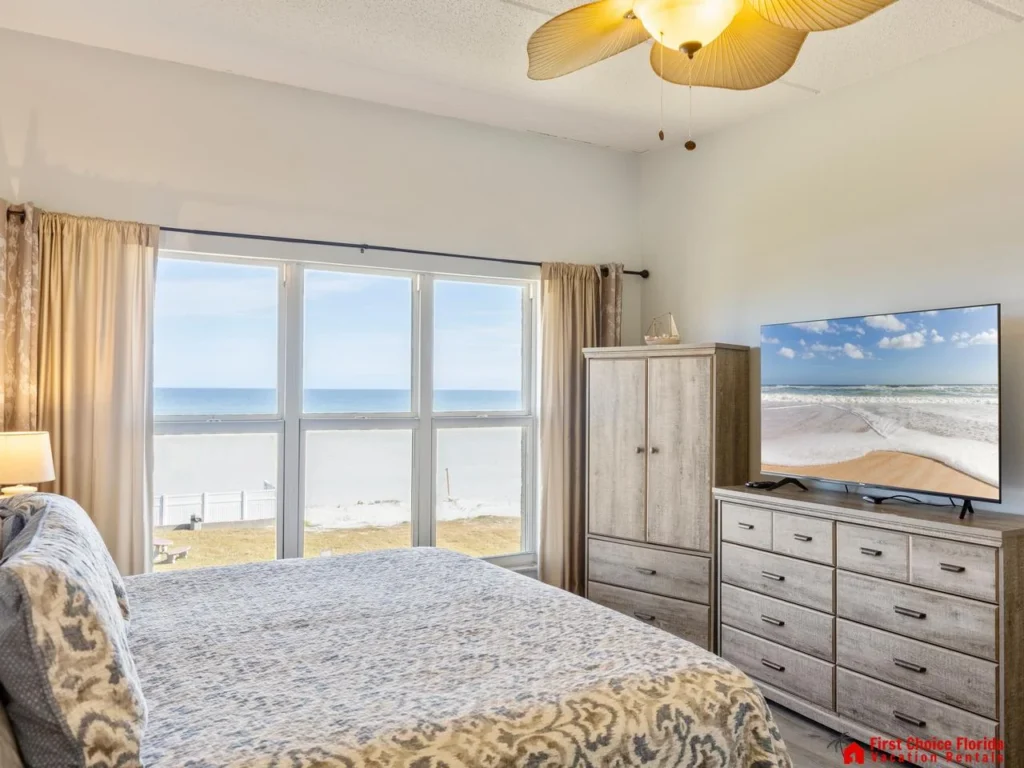 Bright bedroom with ocean views and coastal charm