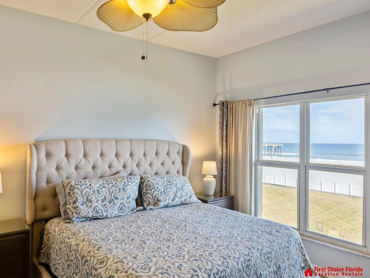 Cozy bedroom with ocean views and natural light