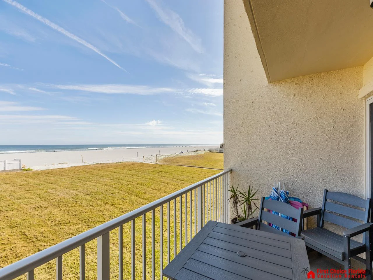 Cozy balcony with stunning ocean and beach views