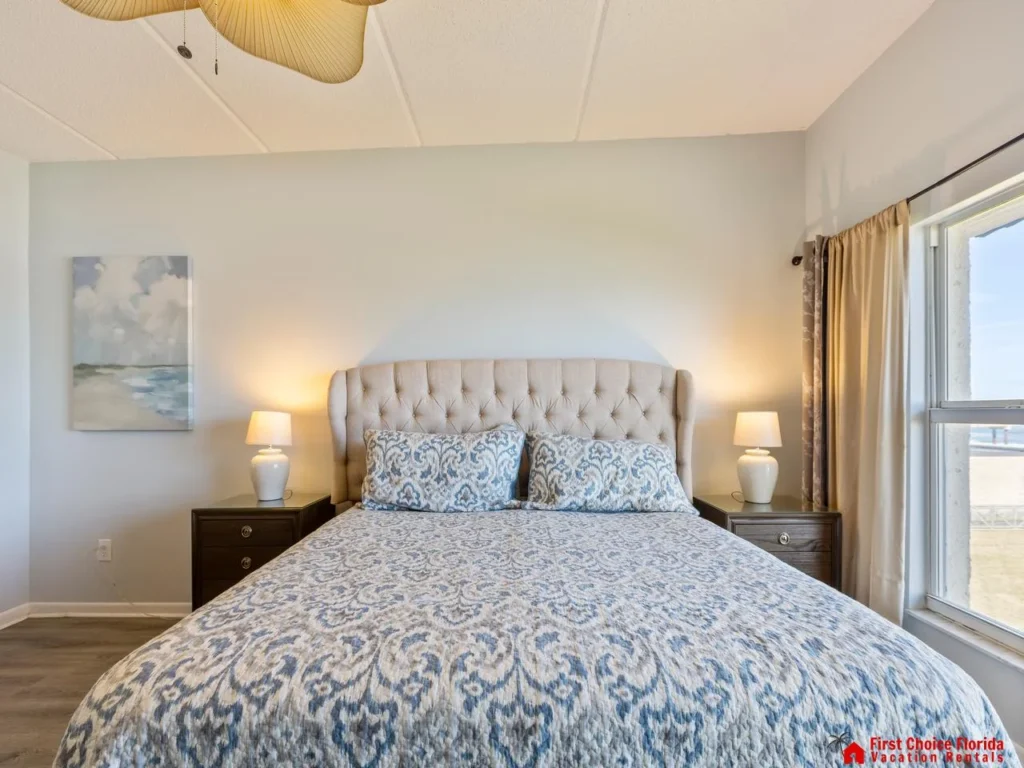 Cozy bedroom with ocean views and soft natural light