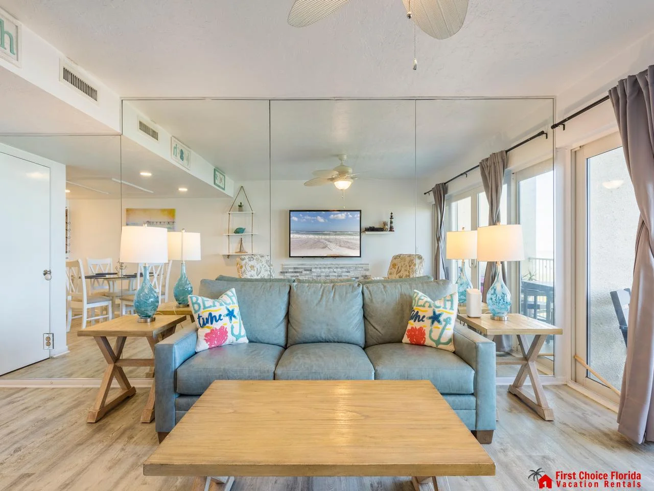 Bright and airy living room with cozy seating and ocean views