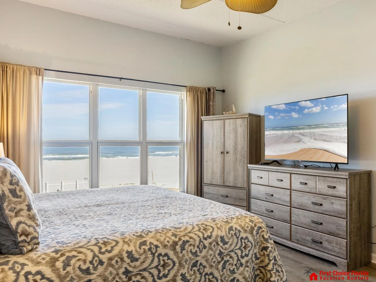 Cozy bedroom with stunning ocean views and natural light