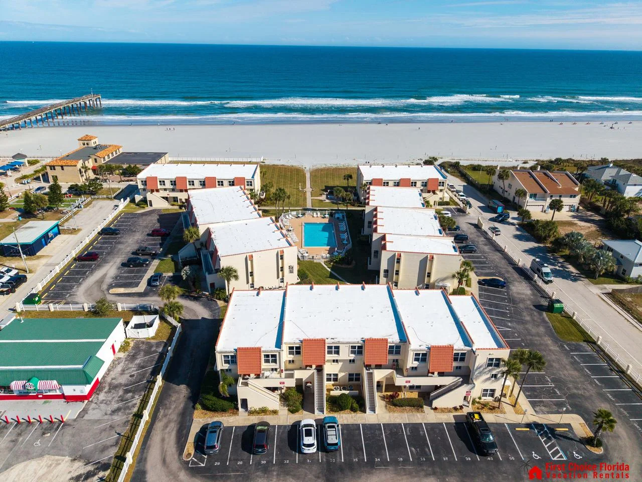 Coastal townhomes steps from the sparkling ocean shore