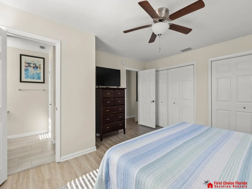 Bright and airy bedroom with ample natural light and storage