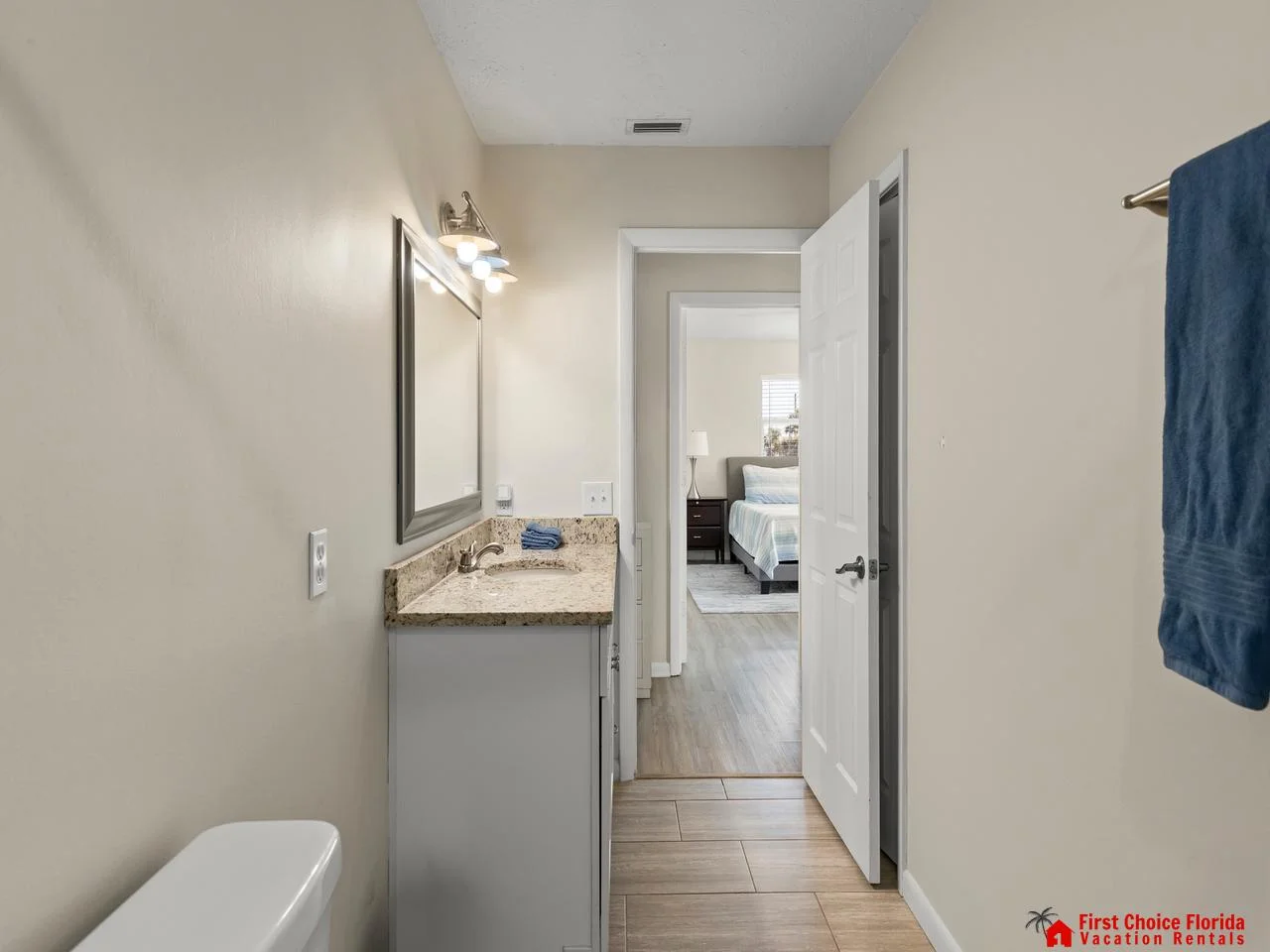 Bright, modern bathroom with sleek vanity and spacious layout