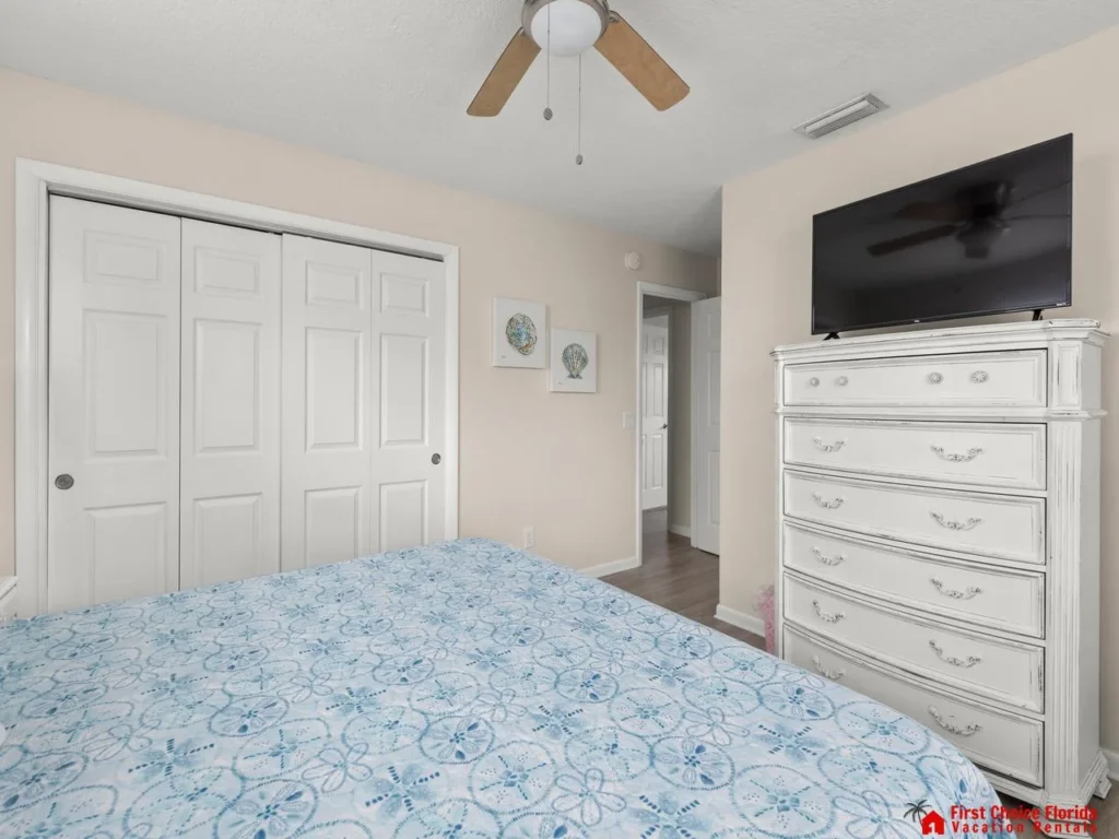 Cozy bedroom retreat with ample storage and natural light