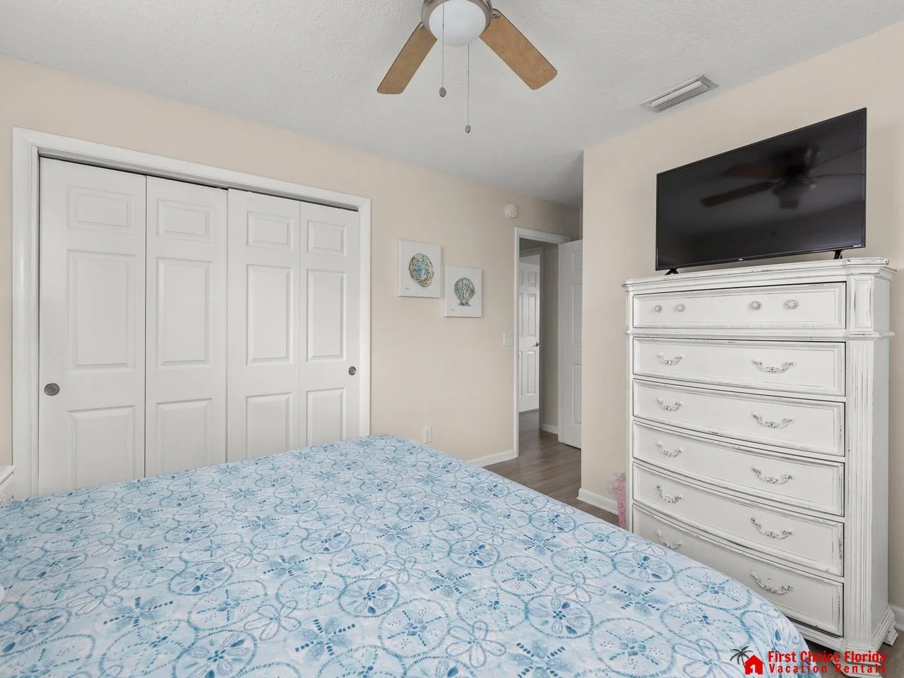 Cozy bedroom retreat with ample storage and natural light