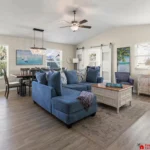 Spacious living room with cozy seating and natural light