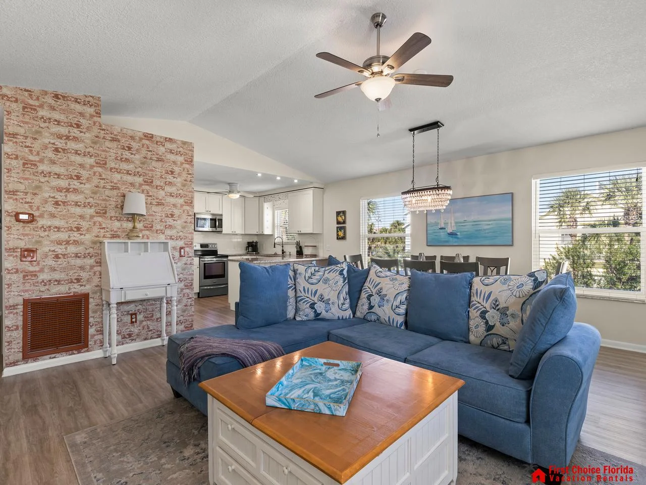 Spacious living room with cozy fireplace and scenic views