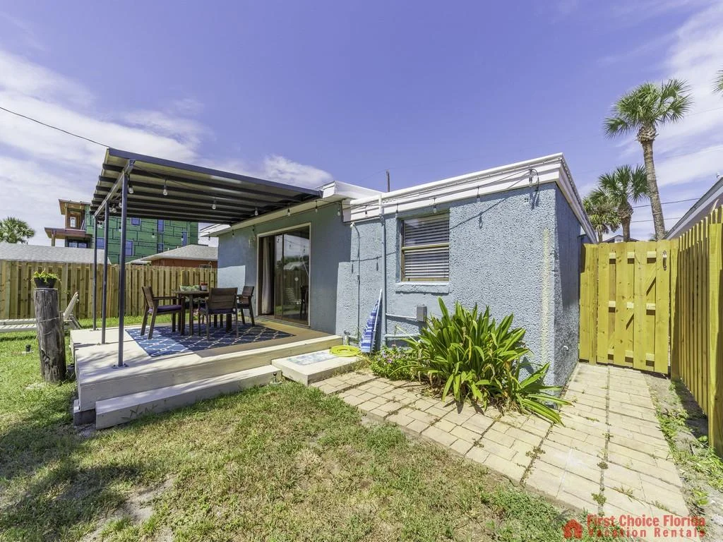 Covered Patio with Fenced in Backyard