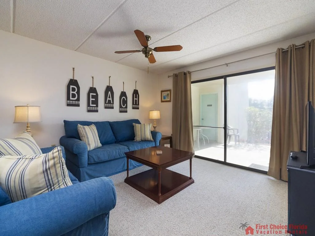 Island South Condominium 18 Living Room with Patio