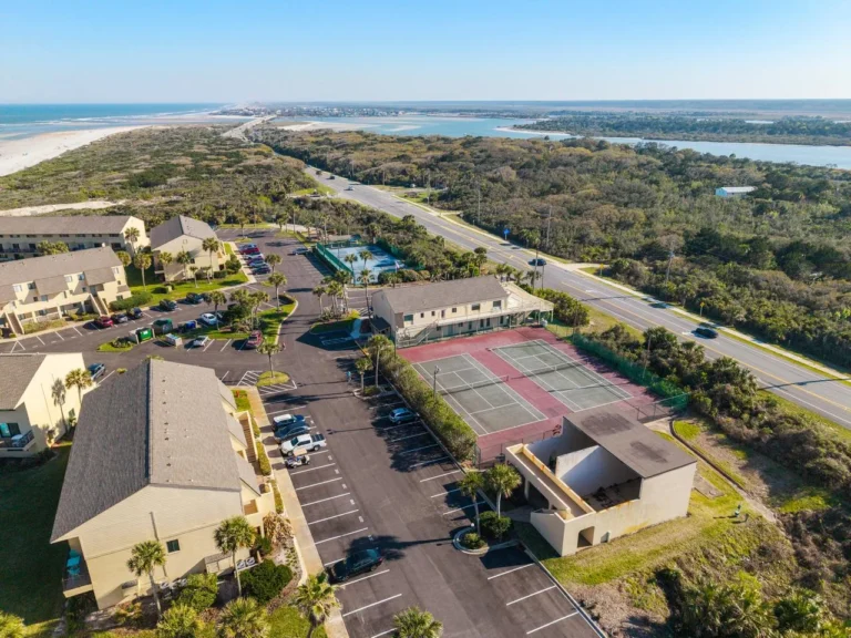 Spacious outdoor tennis courts near scenic coastal trails